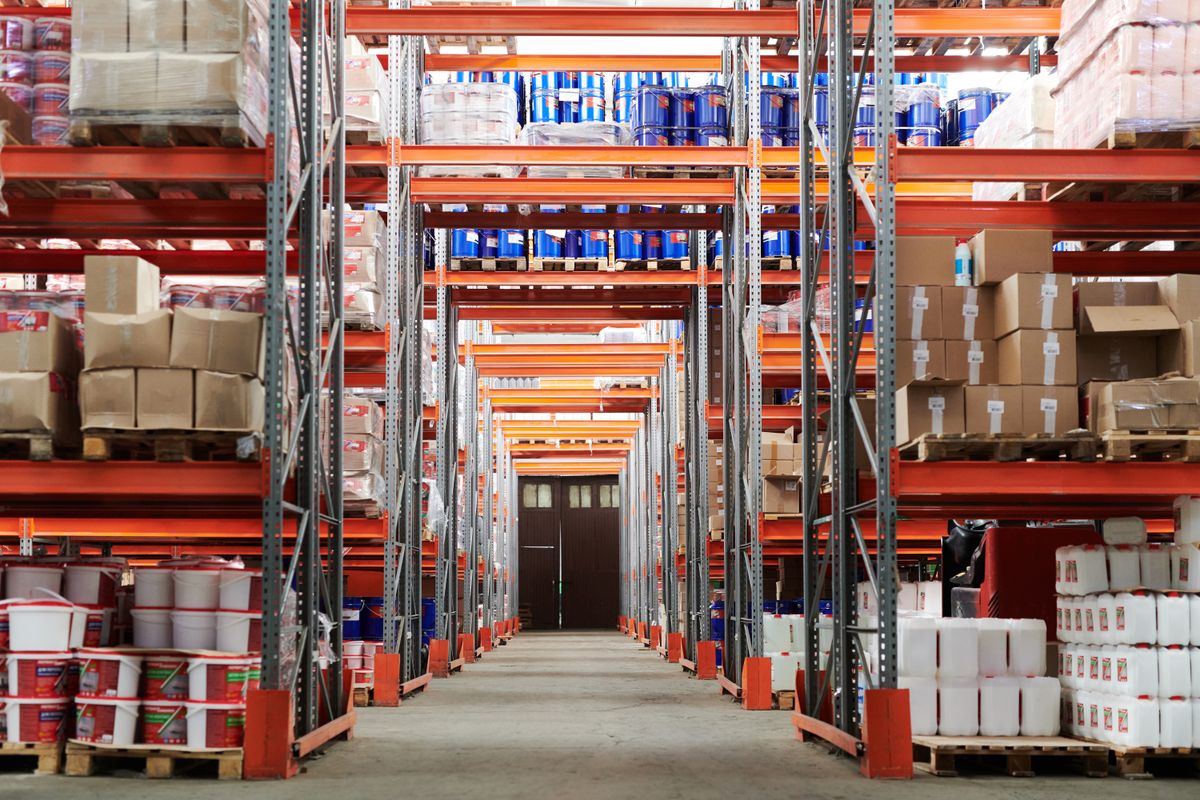 Warehouse aisle with inventory racks